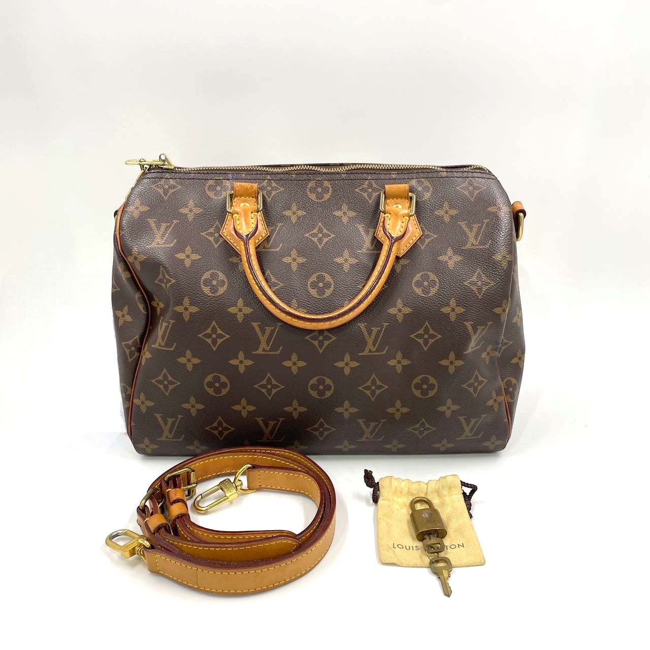 Pre-Owned Louis Vuitton Speedy 35 Monogram Canvas Bag with Strap and Lock