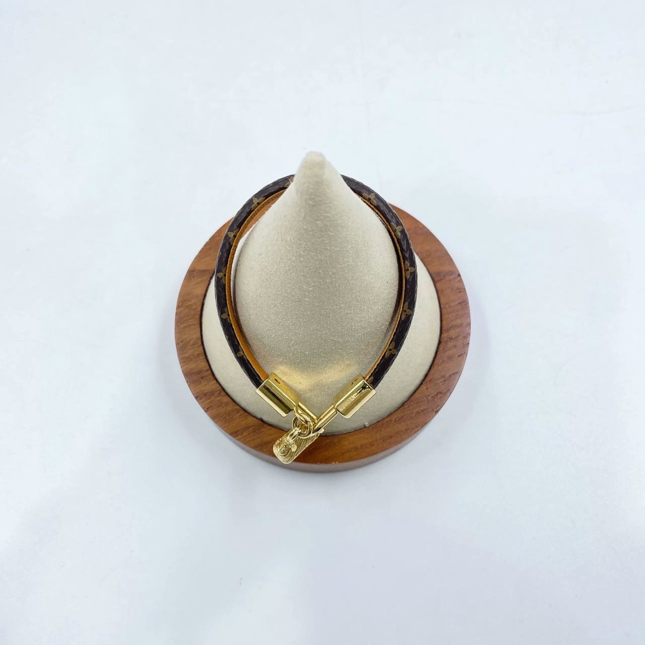 Pre-Owned Louis Vuitton Monogram Bracelet with Gold-Tone Lock Charm