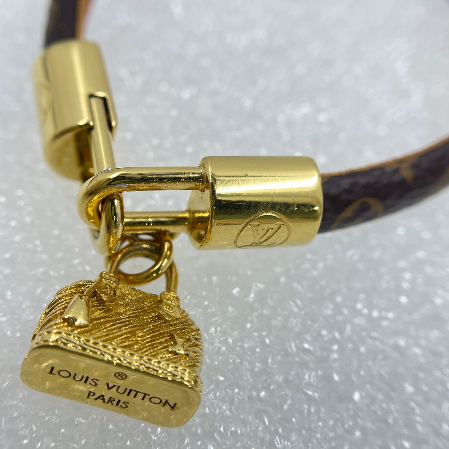 Pre-Owned Louis Vuitton Monogram Bracelet with Gold-Tone Lock Charm