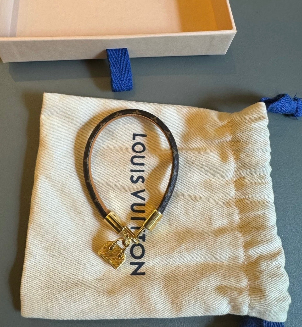 Pre-Owned Louis Vuitton Monogram Bracelet with Gold-Tone Lock Charm