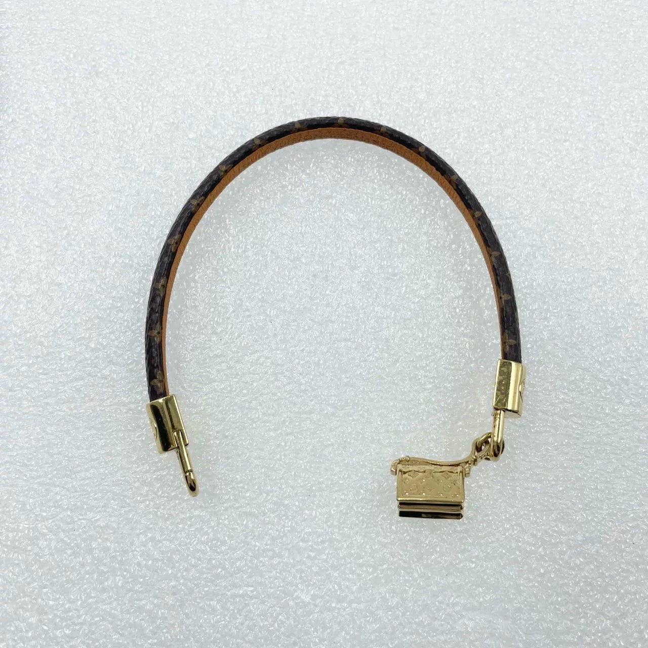 Pre-Owned Louis Vuitton Monogram Bracelet with Gold-Tone Padlock Charm