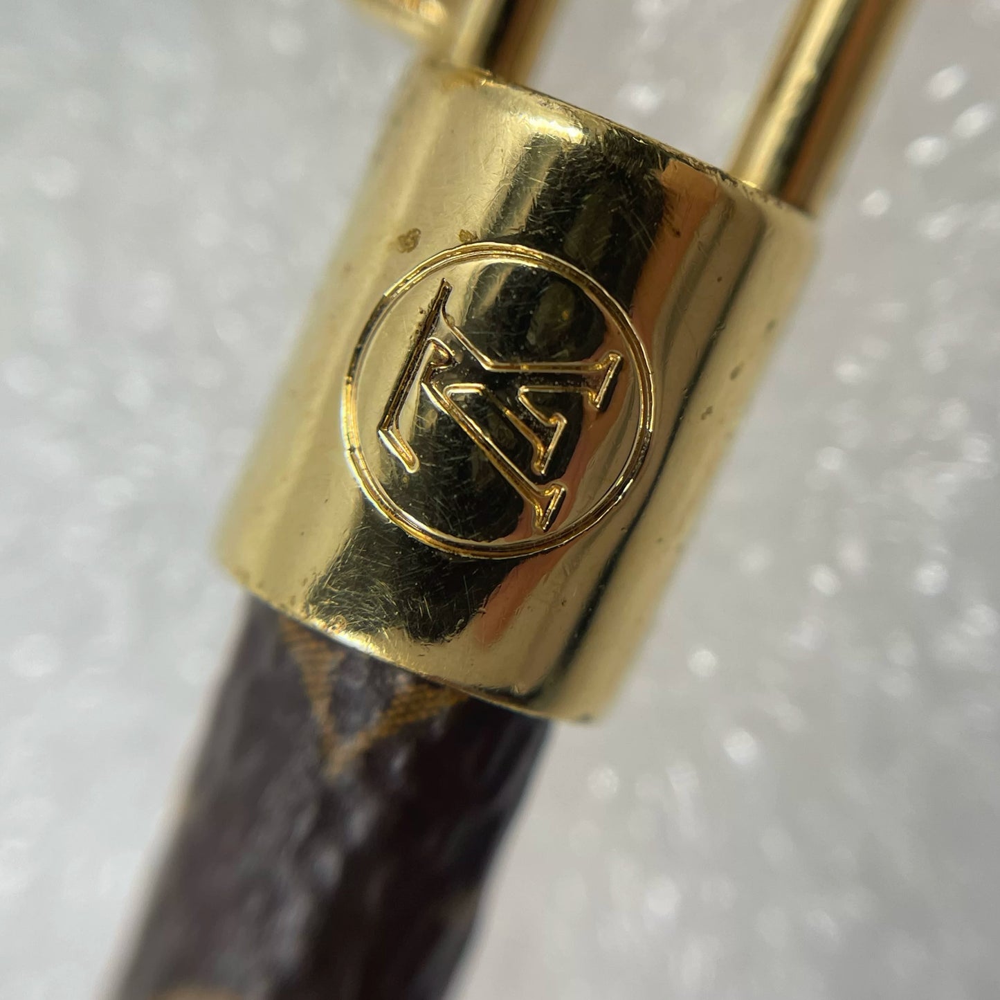 Pre-Owned Louis Vuitton Monogram Bracelet with Gold-Tone Padlock Charm